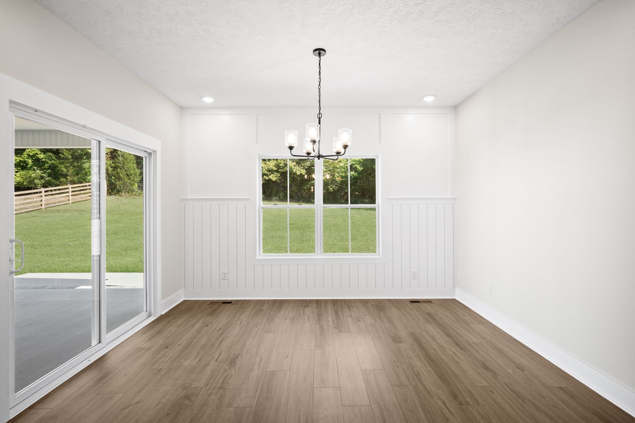 48 Powell Road Clarksville, TN 37043 - Photo 20 of 54 a view of empty room with wooden floor and outdoor view