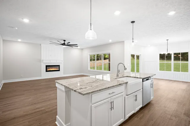 a kitchen with sink and window