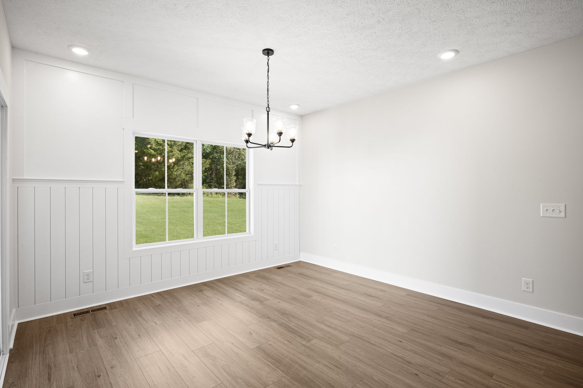 48 Powell Road Clarksville, TN 37043 - Photo 24 of 55 a view of an empty room with a window and wooden floor
