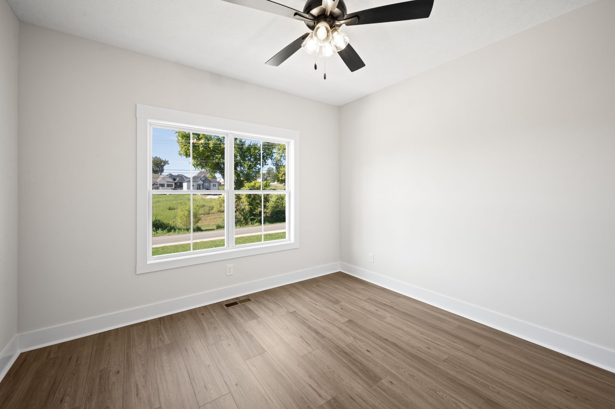 48 Powell Road Clarksville, TN 37043 - Photo 3 of 54 a view of a room with wooden floor and windows