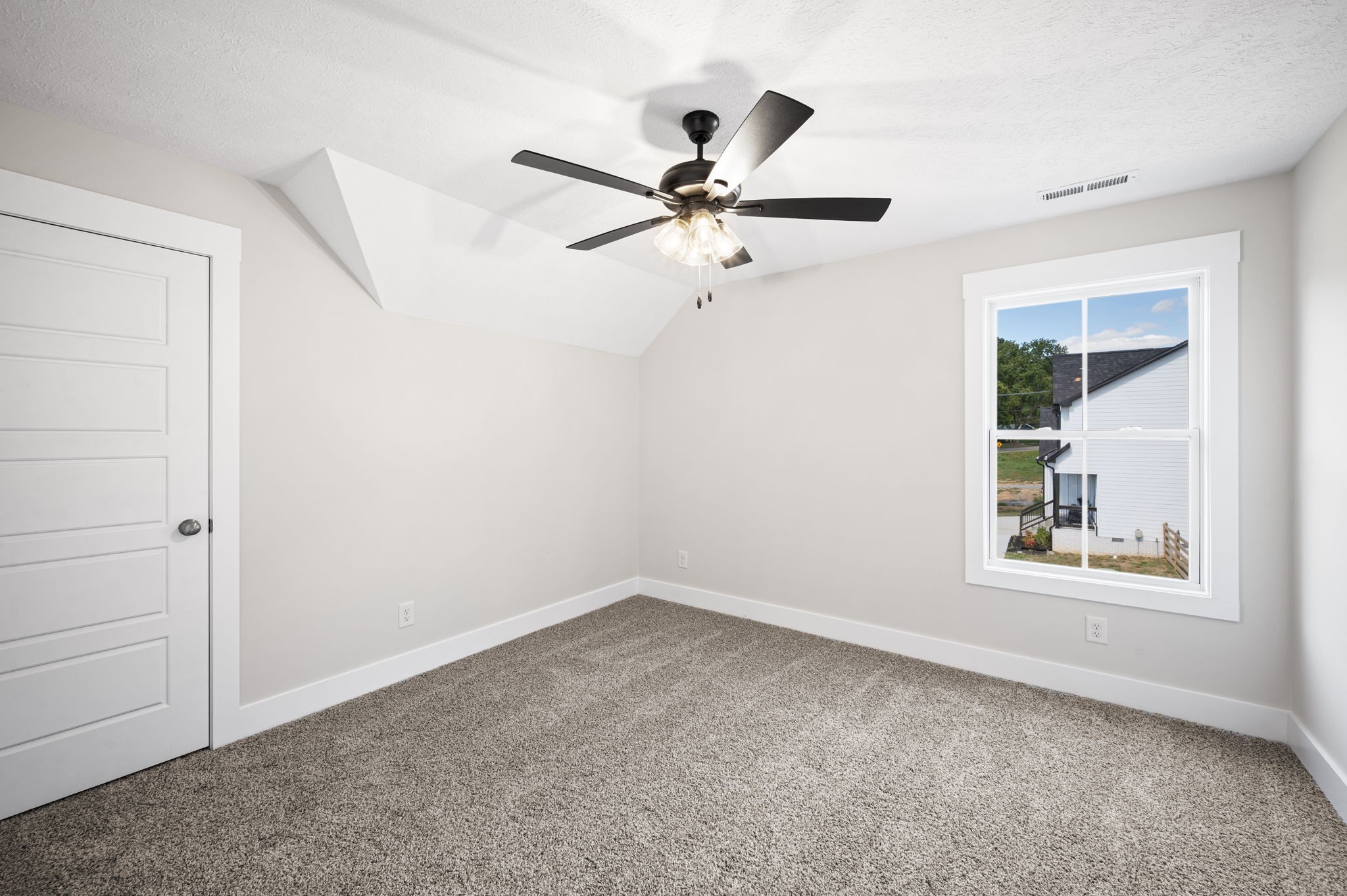 48 Powell Road Clarksville, TN 37043 - Photo 46 of 54 an empty room with windows and fan