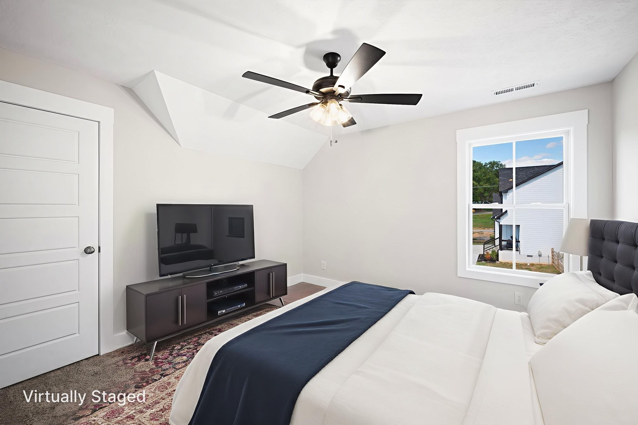 48 Powell Road Clarksville, TN 37043 - Photo 47 of 54 a bedroom with a bed and a flat screen tv