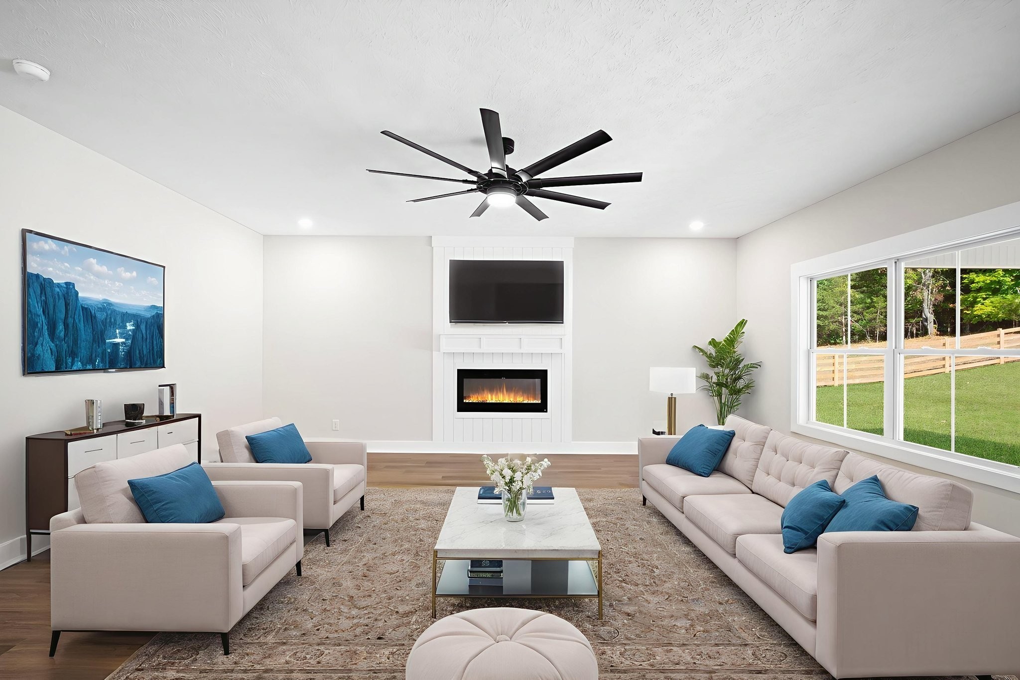 48 Powell Road Clarksville, TN 37043 - Photo 9 of 54 a living room with furniture a fireplace and a flat screen tv