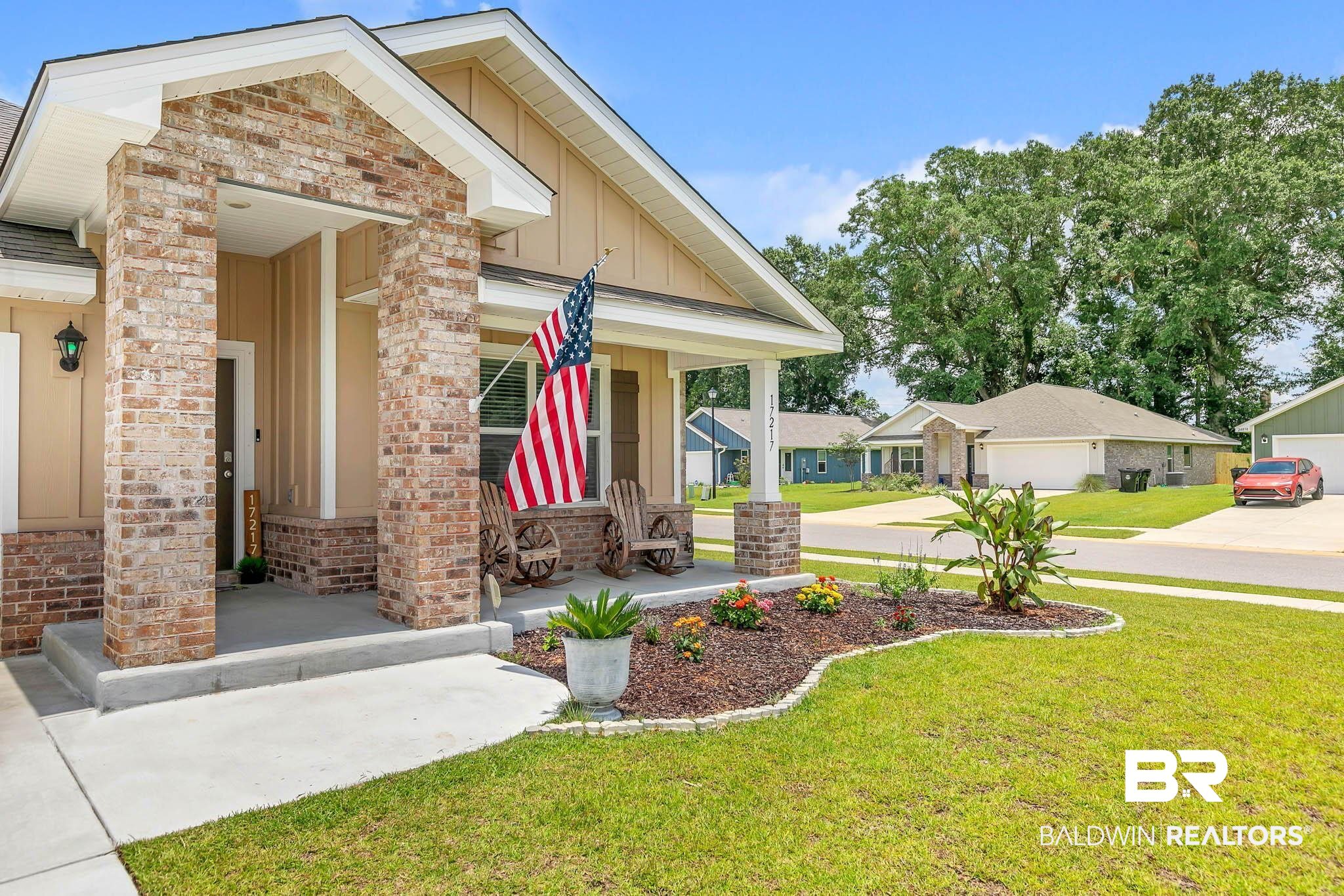17217 REFLECTION Street Loxley, AL 36551 - Photo 80 of 83 Cali floorplan has front porch and beautiful landscaping.