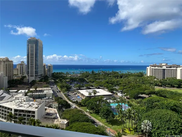 a view of a city with tall buildings