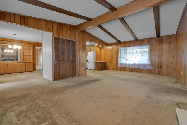 a view of empty room with windows