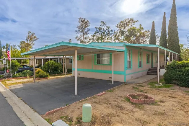 a house view with a outdoor space