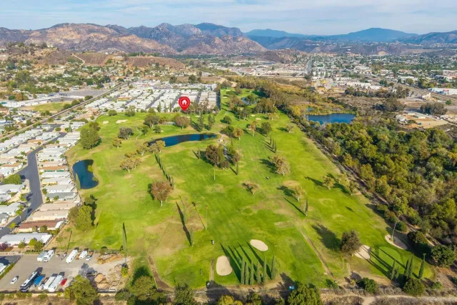 a view of a swimming pool with a lake
