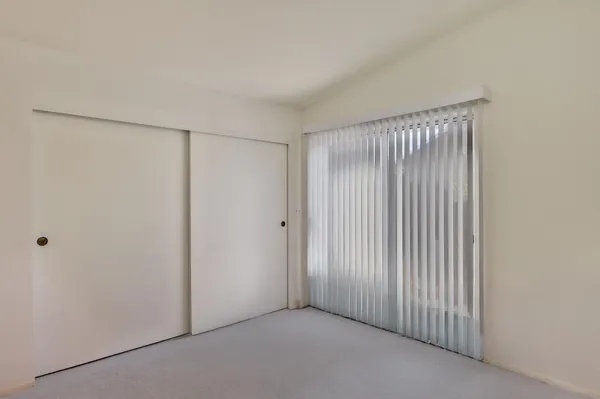 an empty room with a door