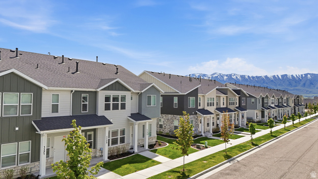 1173 West 1870 South Logan, UT 84321 - Photo 1 of 33 Modern townhome row featuring multi-toned siding and stone veneer exteriors