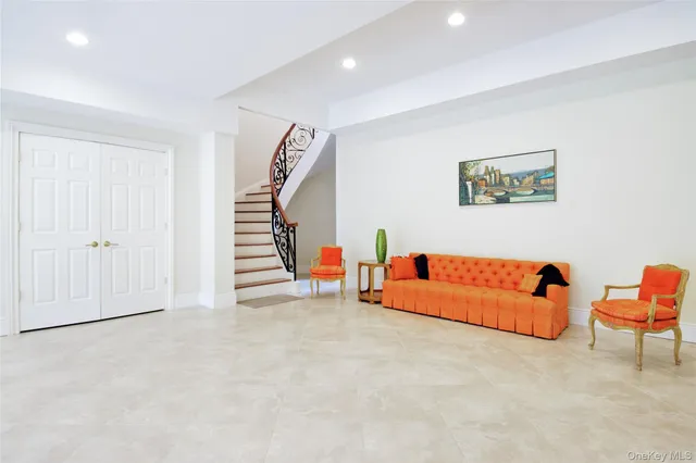 a view of livingroom with furniture and white walls