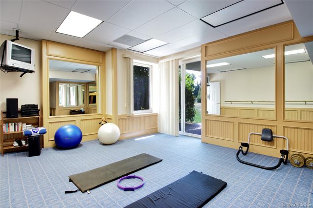 a room with furniture and a wooden floor