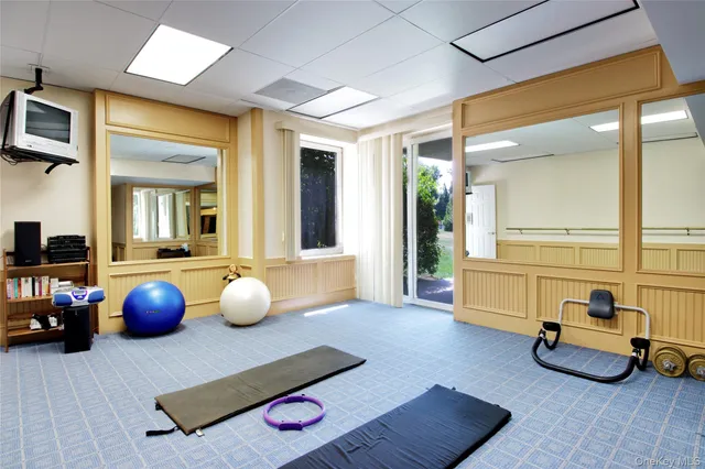 a room with furniture and a wooden floor