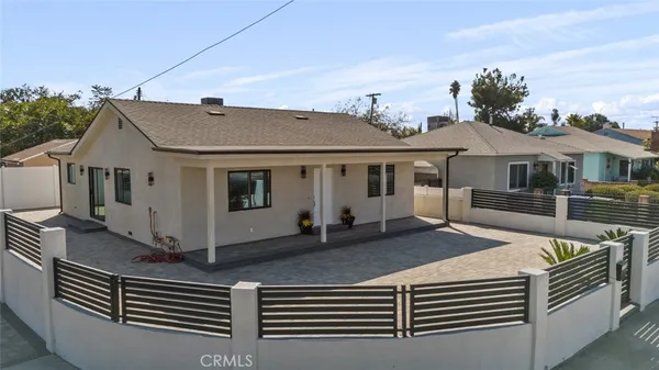 a front view of a house with balcony