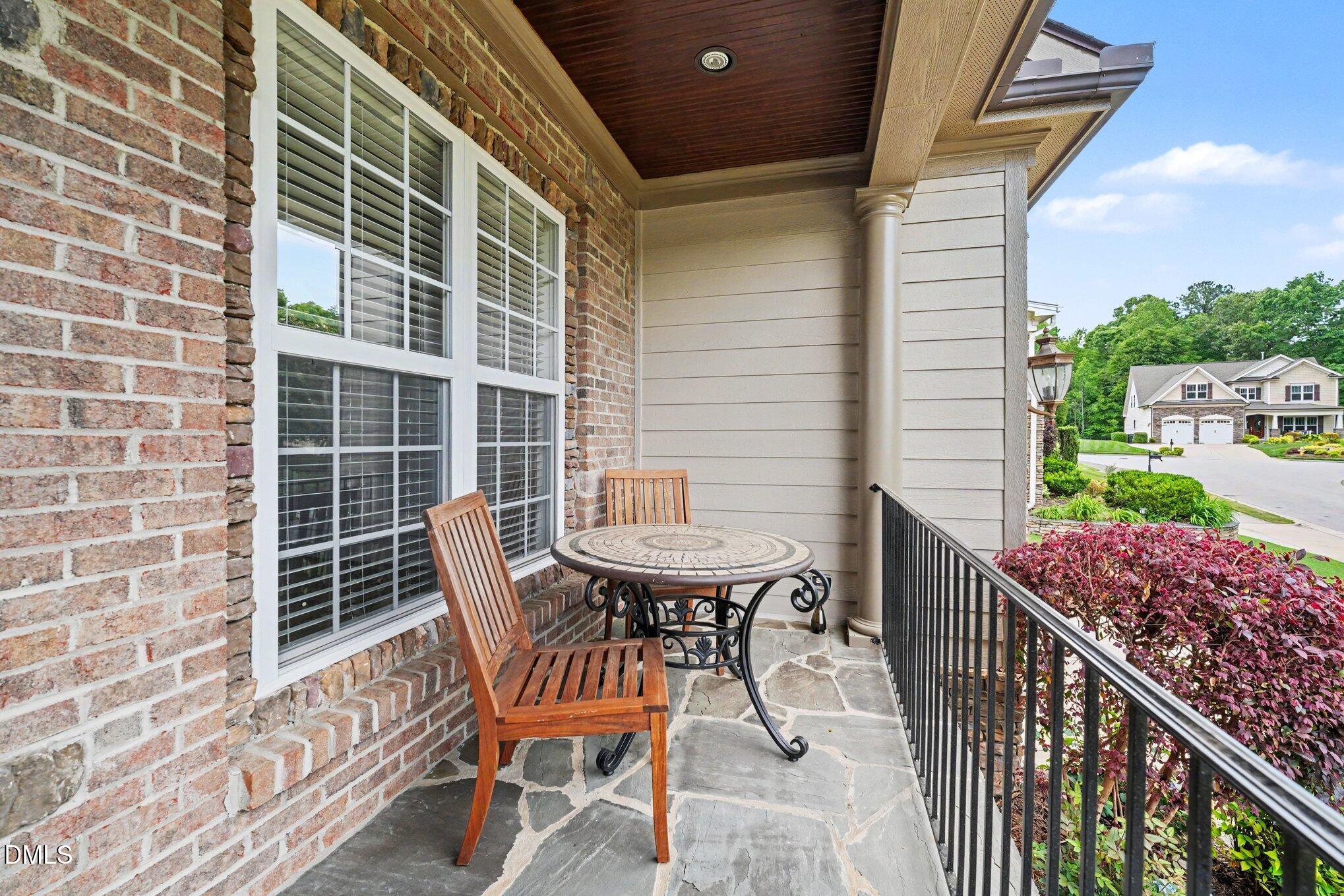 1729 Frenchwood Drive Raleigh, NC 27612 - Photo 37 of 46 a balcony view with a seating space