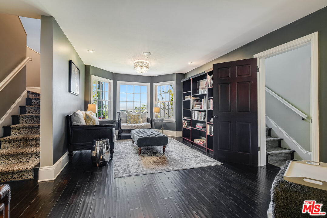 2962 Valmere Drive Malibu, CA 90265 - Photo 15 of 42 a living room with furniture and a wooden floor