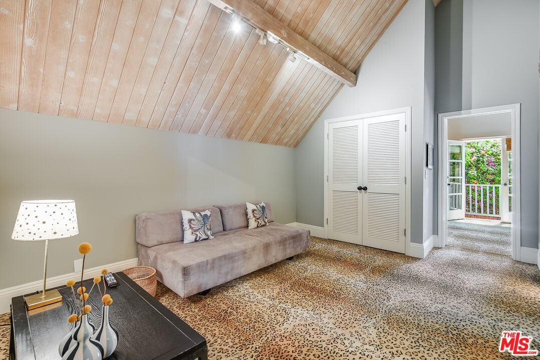 2962 Valmere Drive Malibu, CA 90265 - Photo 34 of 42 a living room with furniture and a window