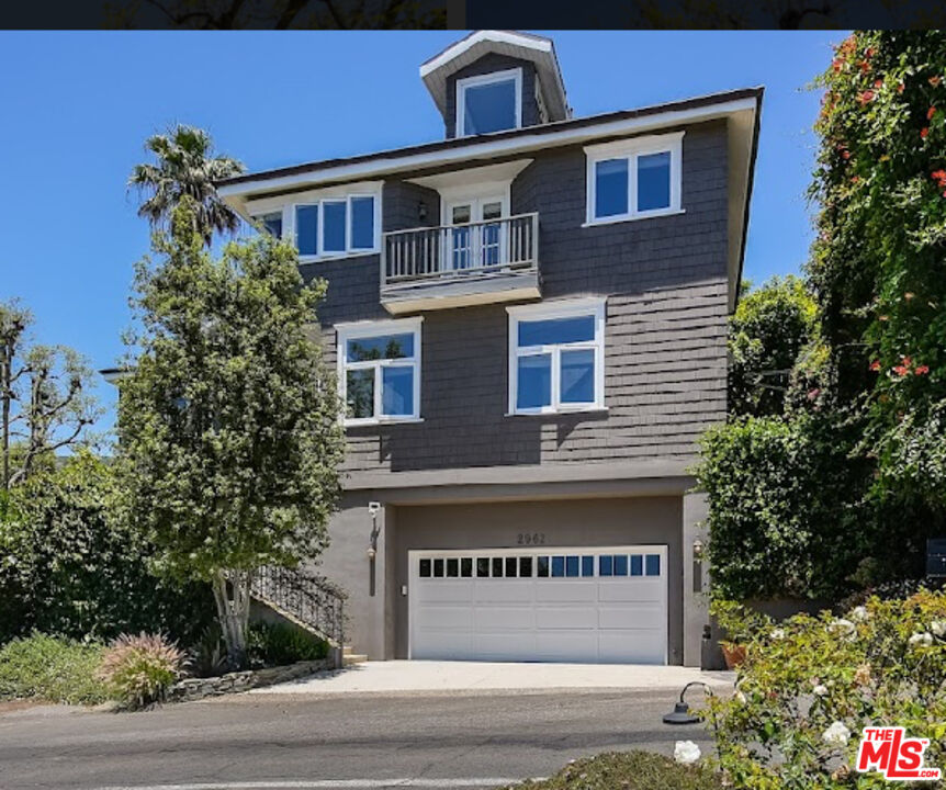 2962 Valmere Drive Malibu, CA 90265 - Photo 40 of 42 a front view of a house with a yard