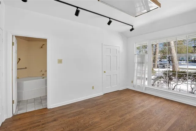 a view of livingroom with hardwood floor and window