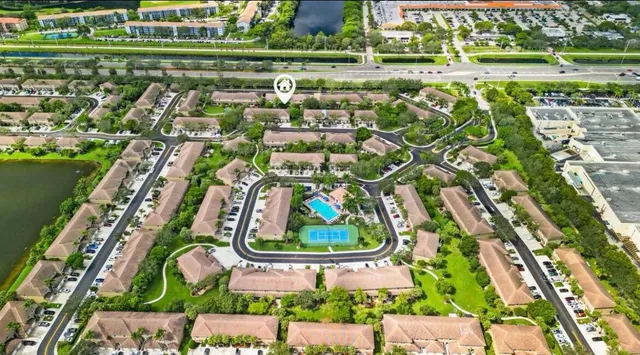 an aerial view of a yard with a garden and plants