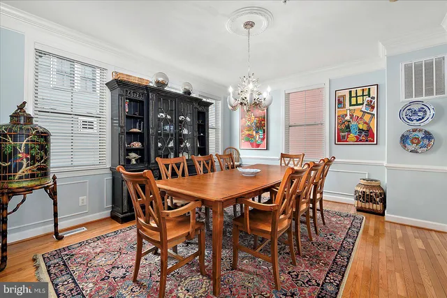a living room with furniture fireplace and window