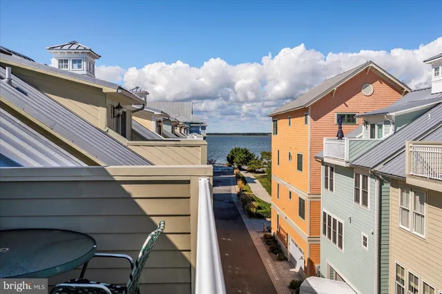 a bedroom with a bed and a chair