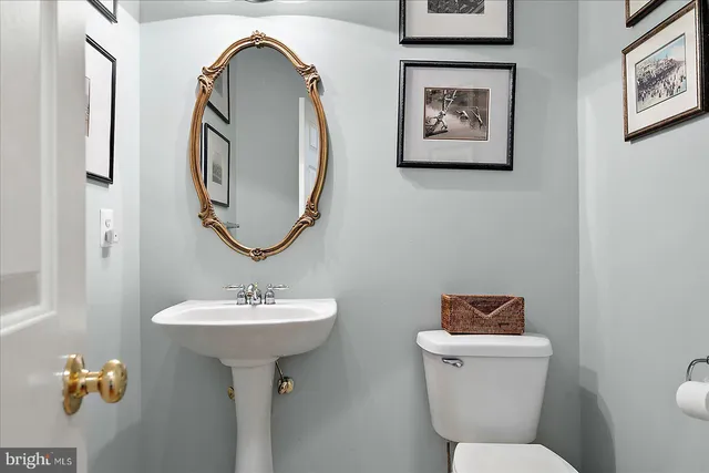 a bedroom with 2 beds and a window