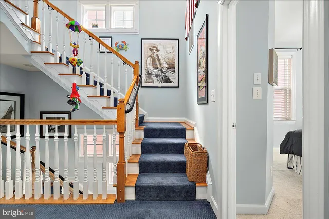 a bedroom that has a bed and a baby in it