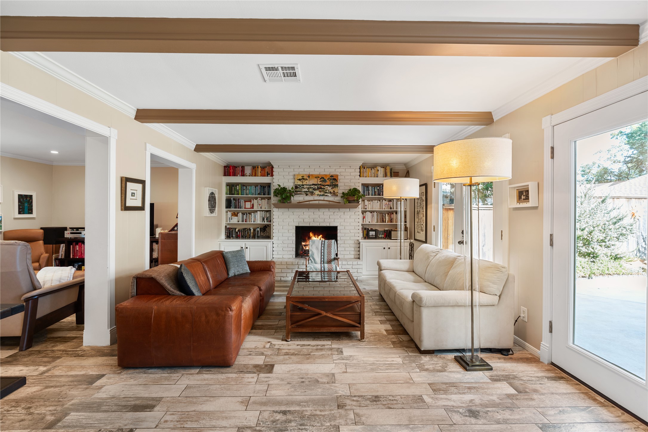 14219 Apple Tree Road Houston, TX 77079 - Photo 5 of 33 Living room with fireplace and built-ins.