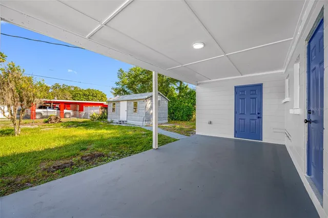 a view of an empty room with a yard
