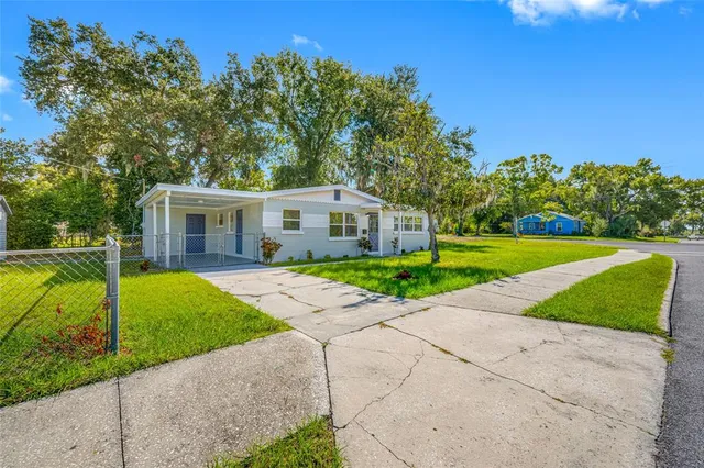 a house with garden in front of it