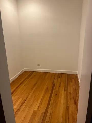 a view of small space with wooden floor