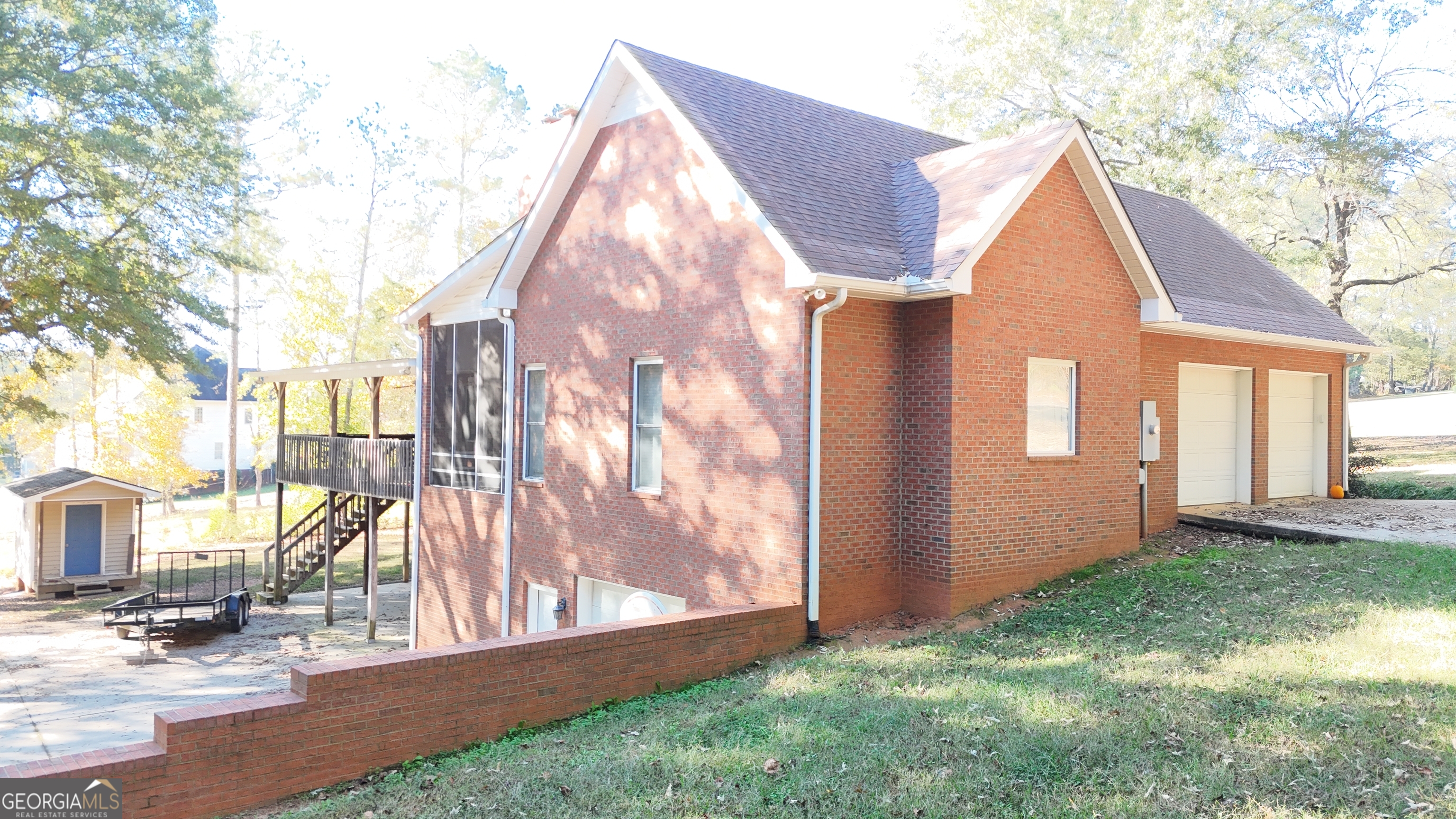518 Fambrough Drive Elberton, GA 30635 - Photo 16 of 74 a view of backyard with a barn and a cactus plant