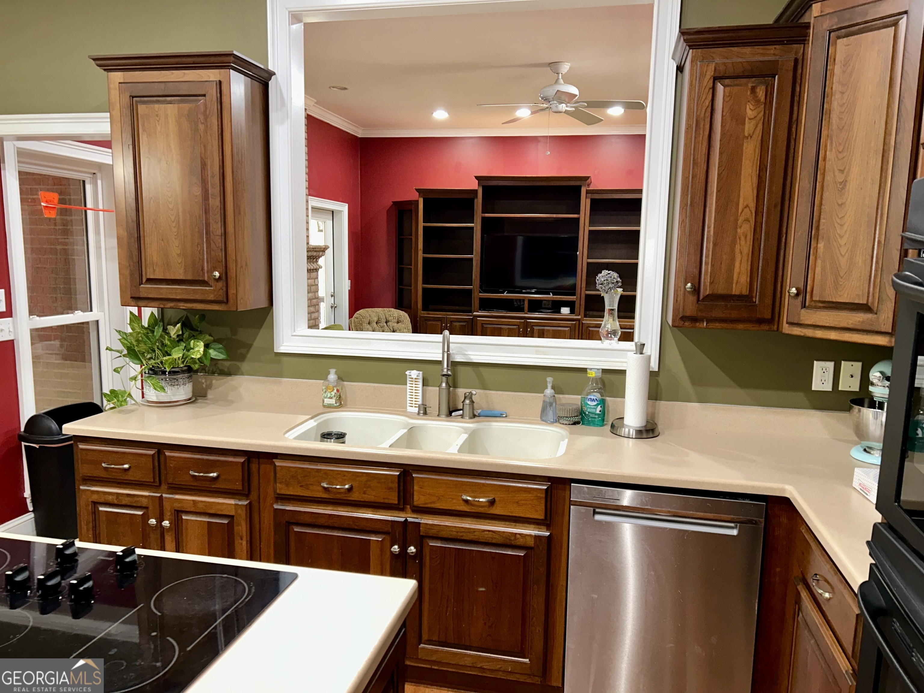 518 Fambrough Drive Elberton, GA 30635 - Photo 30 of 74 a kitchen with a sink and a stove with wooden floor