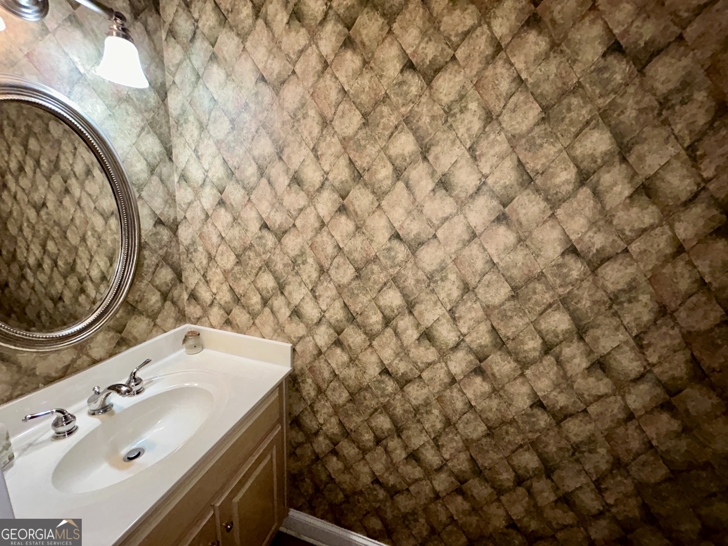 518 Fambrough Drive Elberton, GA 30635 - Photo 41 of 74 a bathroom with a sink and a mirror