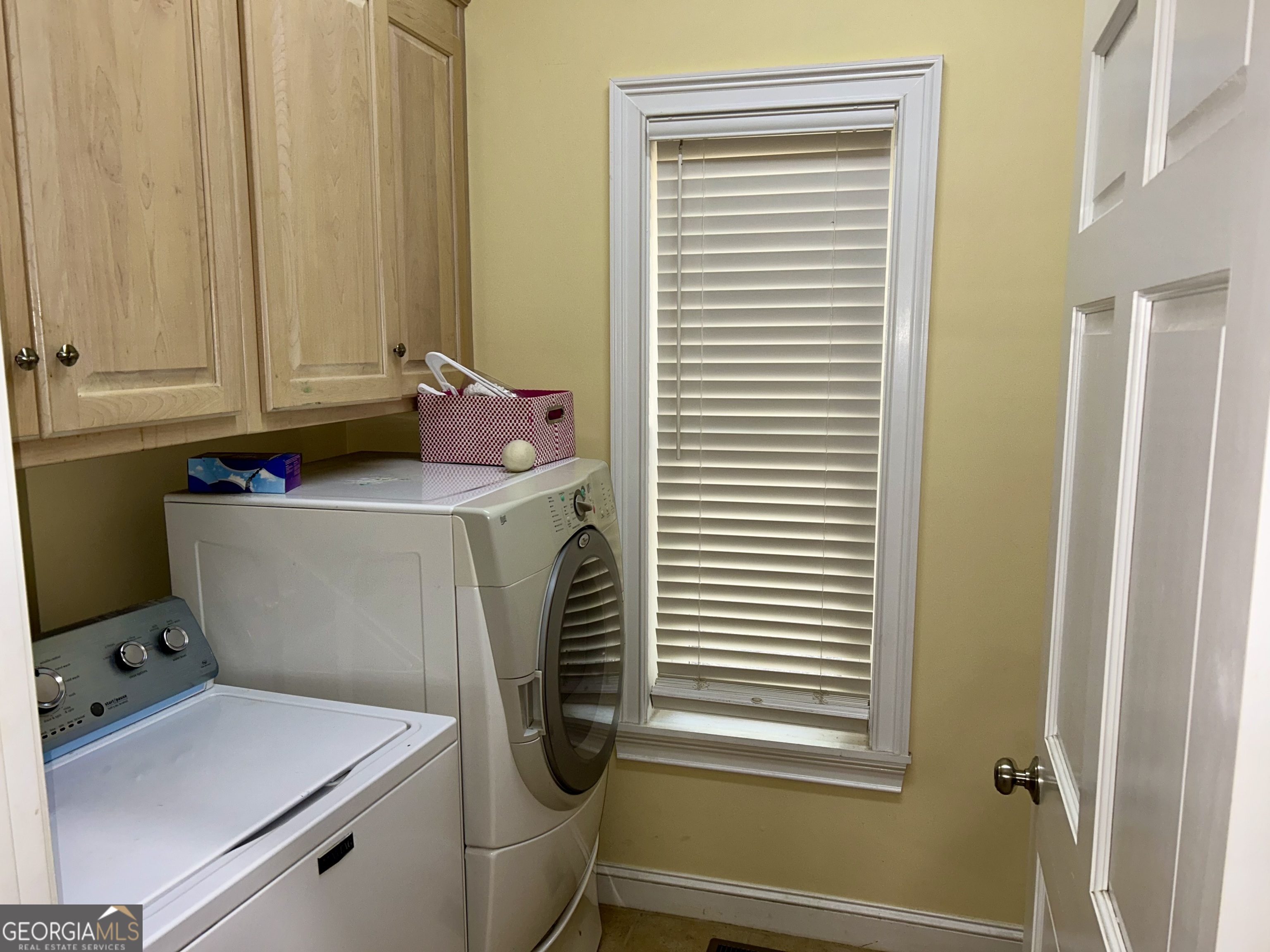 518 Fambrough Drive Elberton, GA 30635 - Photo 47 of 74 a room with water heater and a washer dryer