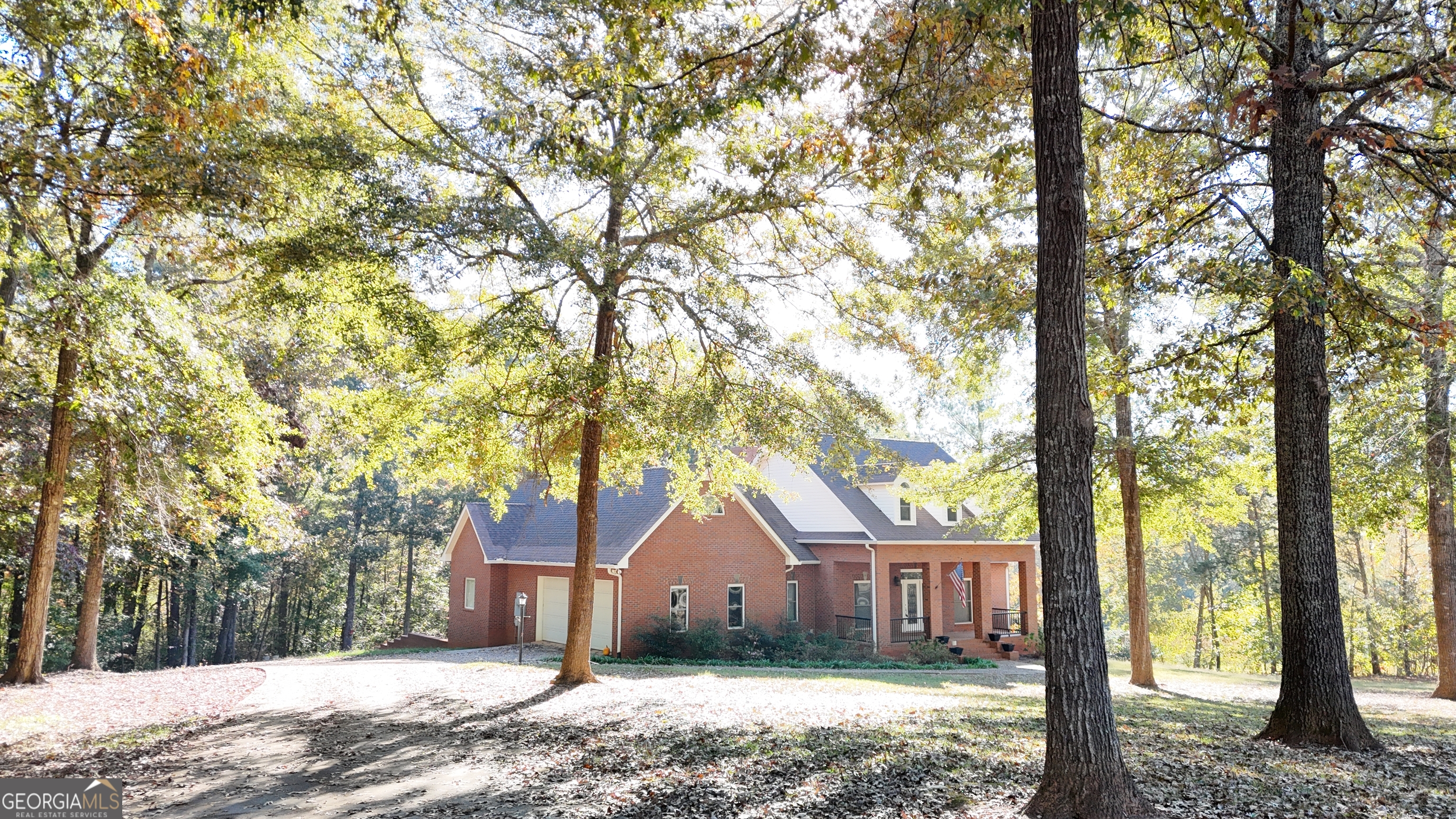 518 Fambrough Drive Elberton, GA 30635 - Photo 5 of 74 a front view of a house with a yard and large tree