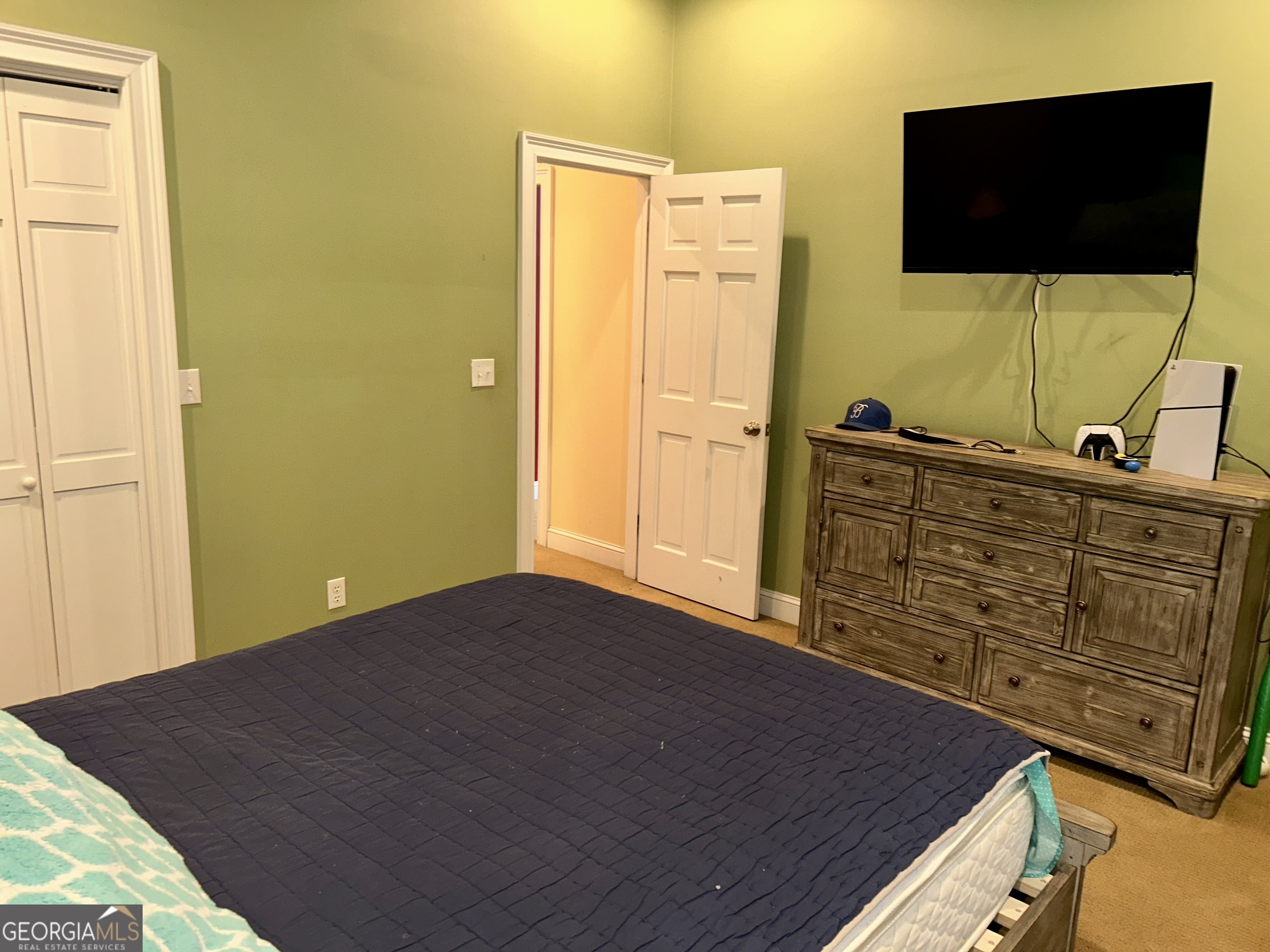 518 Fambrough Drive Elberton, GA 30635 - Photo 52 of 74 a bedroom with a bed and a flat screen tv