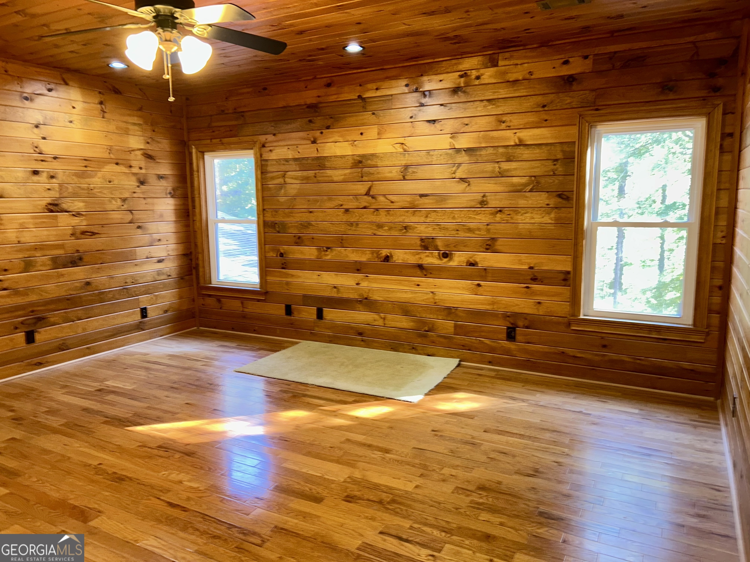 518 Fambrough Drive Elberton, GA 30635 - Photo 57 of 74 a view of empty room with window and wooden floor