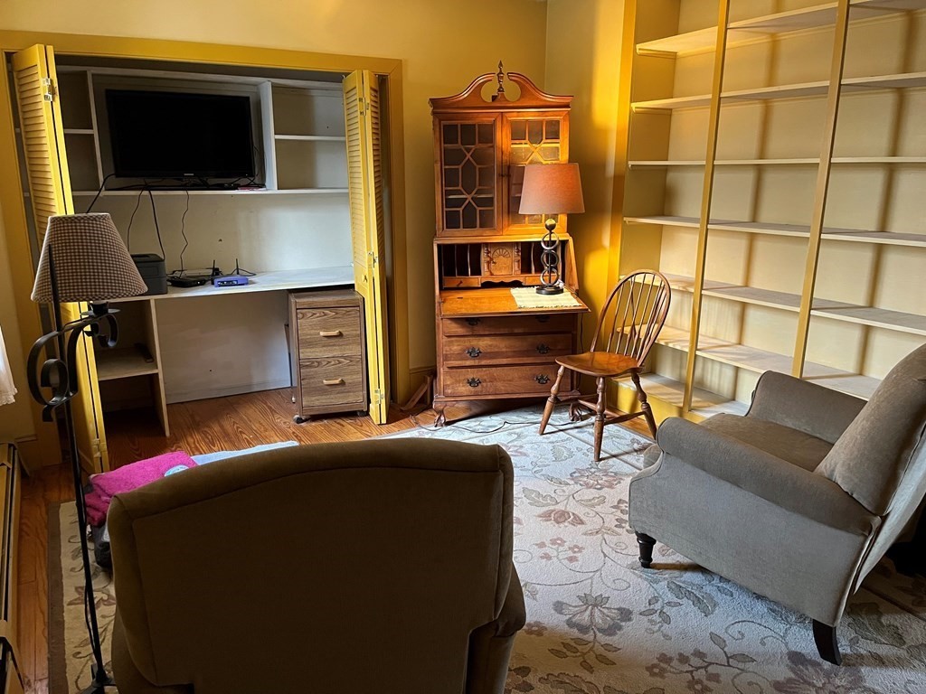 258 Chestnut Street Rehoboth, MA 02769 - Photo 12 of 34 a living room with furniture and a flat screen tv