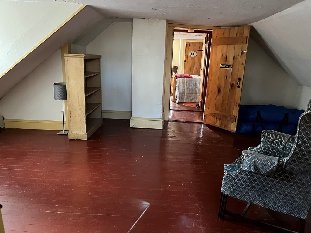258 Chestnut Street Rehoboth, MA 02769 - Photo 19 of 34 a living room with furniture and a wooden floor
