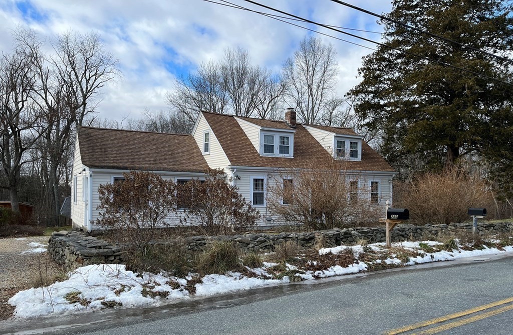 258 Chestnut Street Rehoboth, MA 02769 - Photo 2 of 34 a front view of a house with a yard