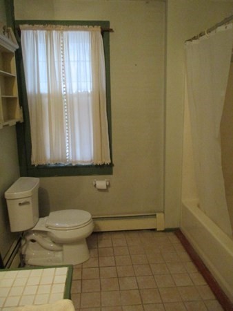 258 Chestnut Street Rehoboth, MA 02769 - Photo 23 of 34 a bathroom with a sink a toilet and a mirror