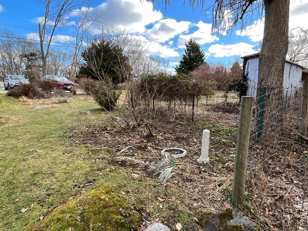 258 Chestnut Street Rehoboth, MA 02769 - Photo 29 of 34 a view of a yard with plants