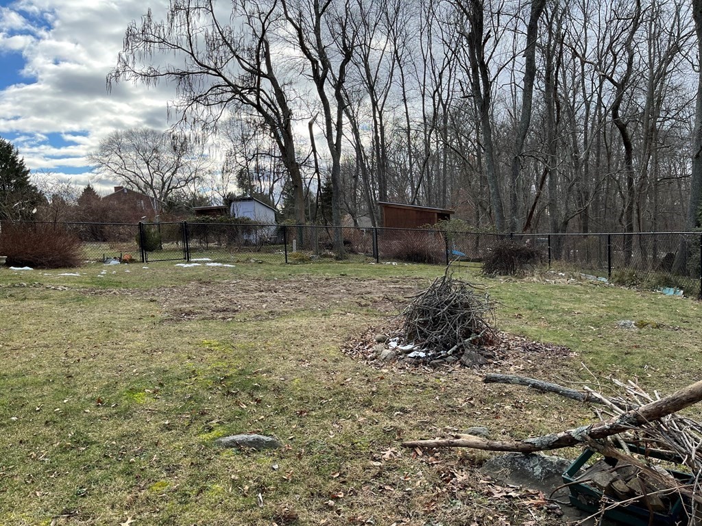 258 Chestnut Street Rehoboth, MA 02769 - Photo 31 of 34 a backyard of a house with lots of green space