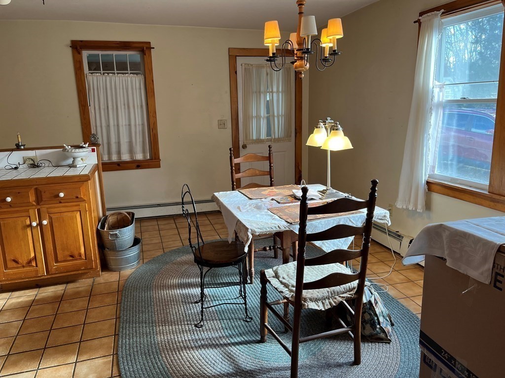 258 Chestnut Street Rehoboth, MA 02769 - Photo 5 of 34 a view of a dining room with furniture and chandelier