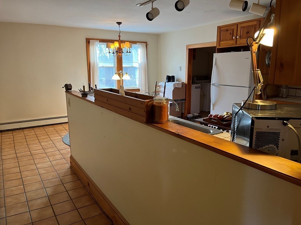 258 Chestnut Street Rehoboth, MA 02769 - Photo 7 of 34 a room with gym equipment and a large window