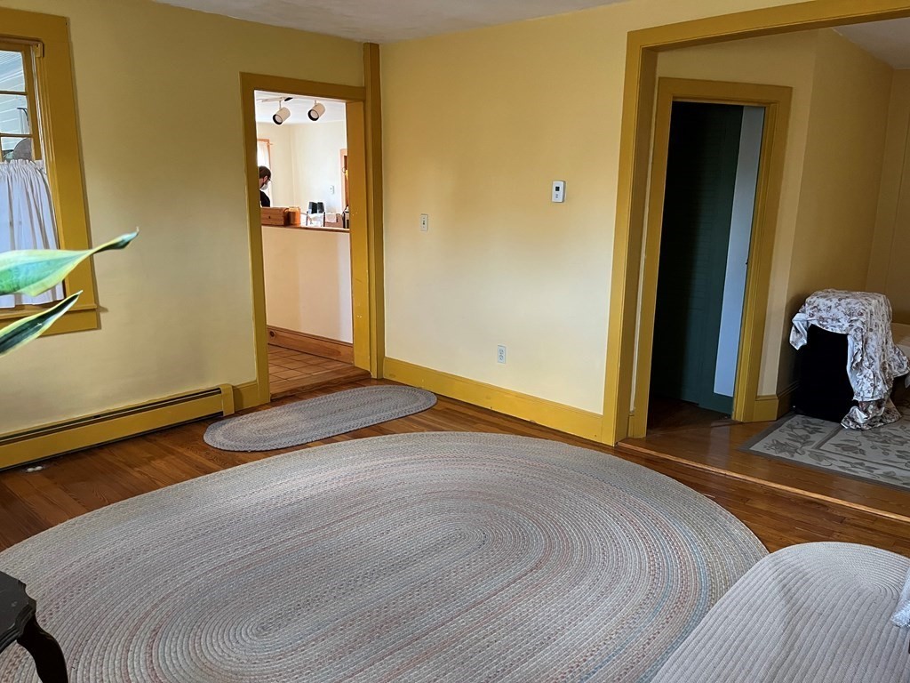 258 Chestnut Street Rehoboth, MA 02769 - Photo 9 of 34 a bedroom with a bed and a mirror on the dresser