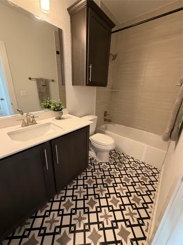 an empty room with a mirror