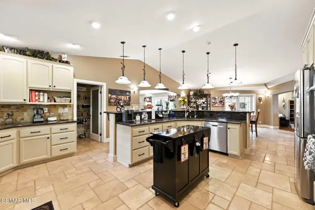 a spacious bedroom with a bed and a window